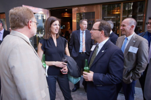 Sierra Chapter members Bob Lokteff (foreground) and Steve Greenfield (right side) with Assembly member Kristen Olsen at the Legislative Reception. 